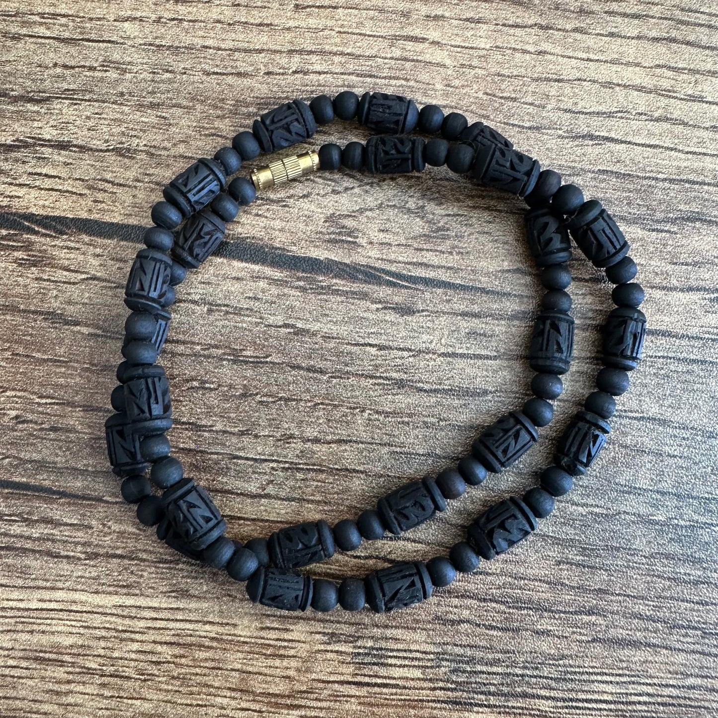 1 round Radha bead + gol moti black tulsi mala