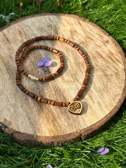 Small radha locket with long bead brown tulsi mala (ghee dipped)