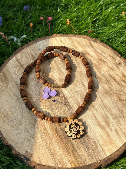 Shri radha flower shape locket with brown radha engraved tulsi mala 18 inch (ghee dipped)