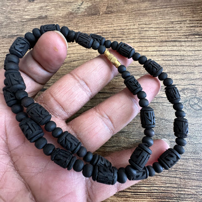 1 round Radha bead + gol moti black tulsi mala