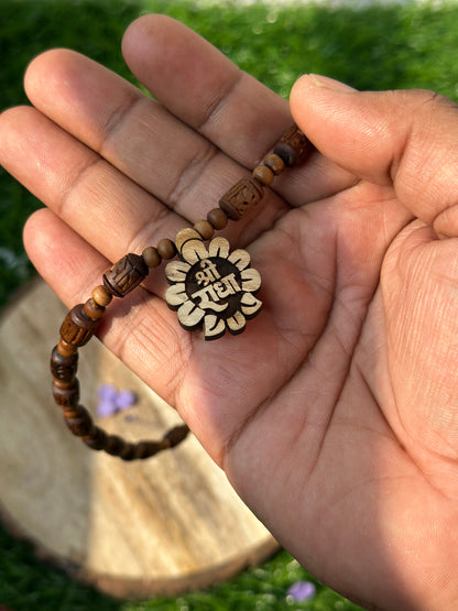 Shri radha flower shape locket with brown radha engraved tulsi mala 18 inch (ghee dipped)