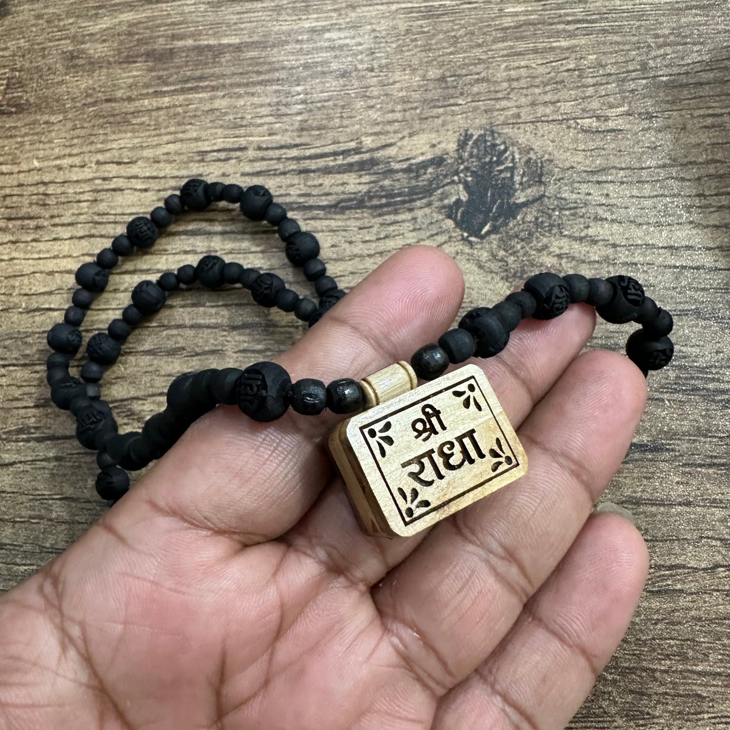 Shri radha bhaktmaal tulsi mala with black radha engraved pure tulsi beads 24 inch
