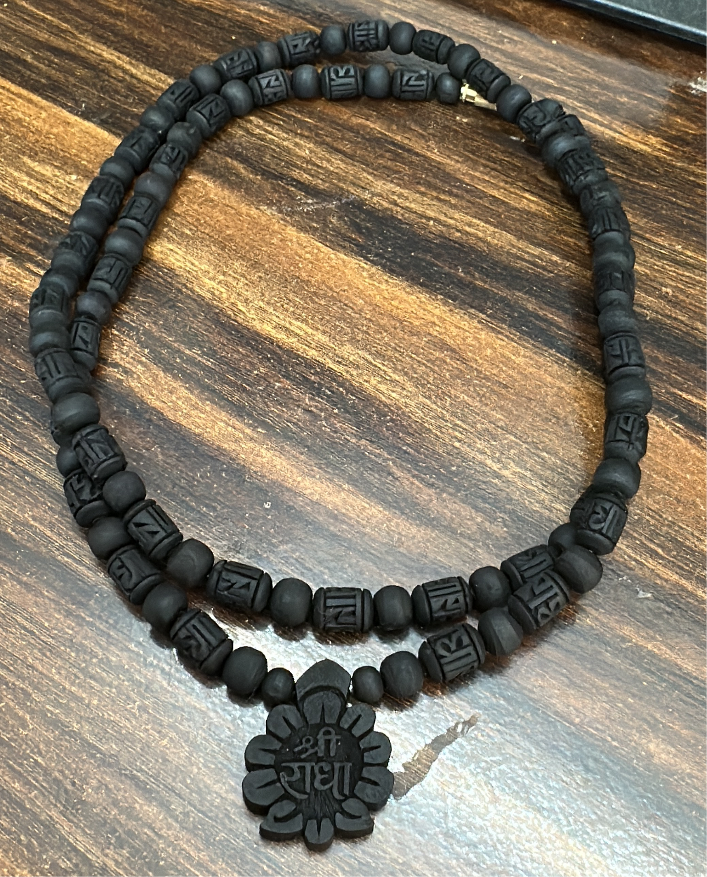 2 round black tulsi mala with radha flower locket including radha engraved bead 8 MM